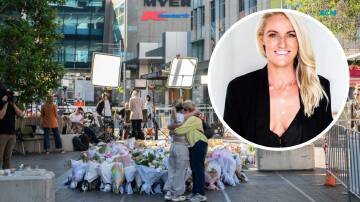 Mourners lay flowers at Bondi Junction's Westfield shopping centre. Picture supplied/AAP Image/Flavio Brancaleone