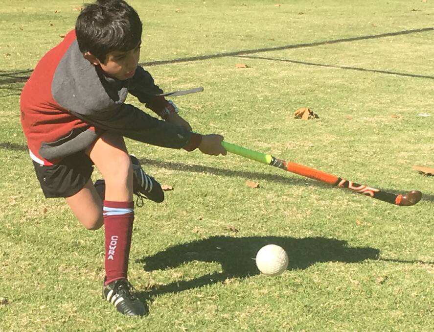 Cowra Junior Hockey: Xander DeWit plays the ball for Canowindra. Canteen and Umpiring Duties: This week 10:30am–1:30pm Bowling Club 1:30pm- 3:45pm Cowra Auto.