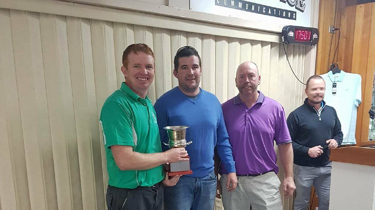 Winners: Dion McAlister and Simon MacKinney receiving their trophy form Mick Sheehy