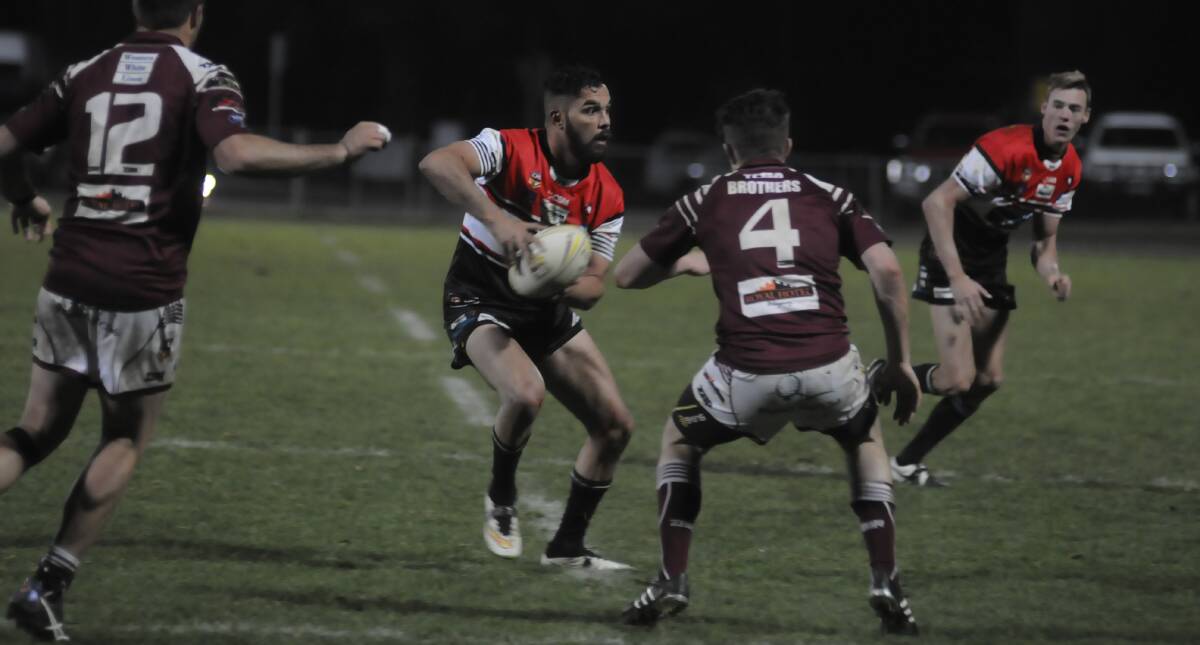 TWICE AS NICE: Jeremy Gordon scored two tries for the Bathurst Panthers as they defeated the Blayney Bears in freezing conditions at Carrington Park on Saturday night. The win takes them to the top of the Group 10 premier league ladder. Photo: CHRIS SEABROOK 	062516cpan7a