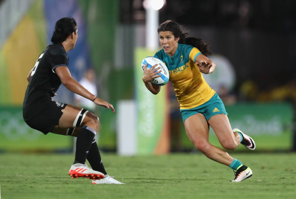 OUT CHANCE: Charlotte Caslick in action for the gold medal winning Australian women's rugby sevens side. Photo: GETTY