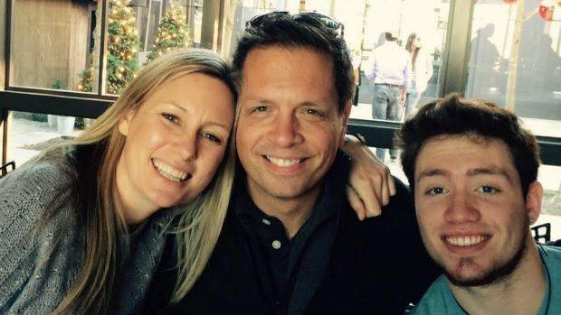 Justine Damond, left, pictured with her fiance Don and Don's son Zach. Photo: Facebook

