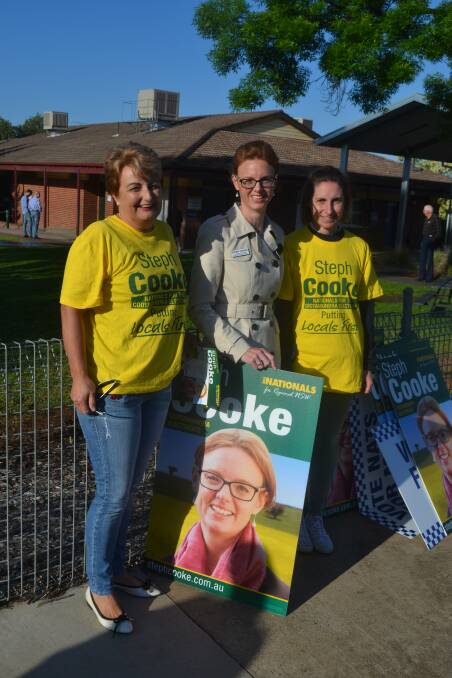 National Party candidate Steph Cooke with supporters Ruth Fagan and Alex Toothe at the Cowra Public School on Saturday morning.