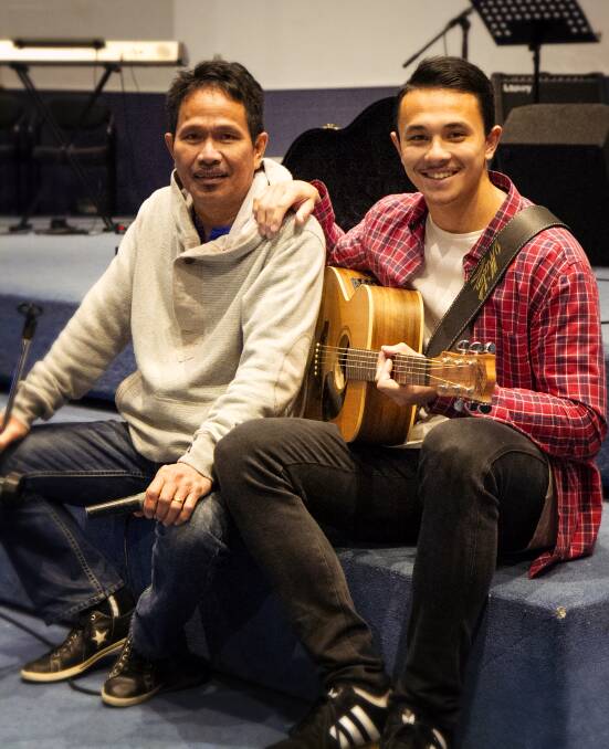 TALENTED: Like father, like son. Cyrus Villanueva is taking on the musical talents of his father Jo Vill, a regular on the Illawarra music scene. Both are part of the worship ministry at the NewDay Church in Figtree. Picture: Jo Gottle.