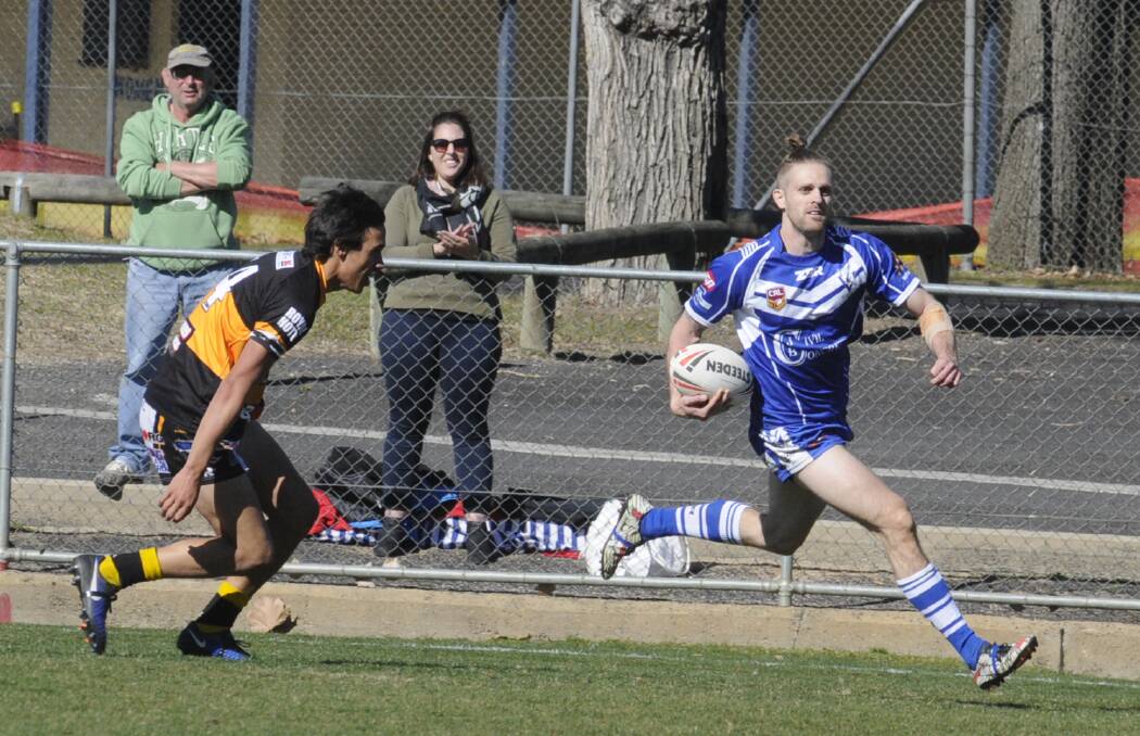 HIGH FIVE: St Pat's centre Adam Morton runs clear for his fifth and final try of the day in the 64-14 win over Oberon Tigers on Sunday. Photo: CHRIS SEABROOK