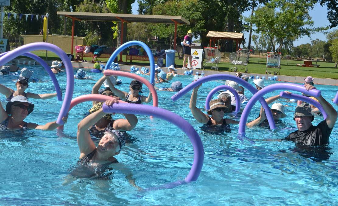 Participants range in age from 20s to their late 90s and take part in water aerobic activities including using weights and pool noodles to build up core strength.  