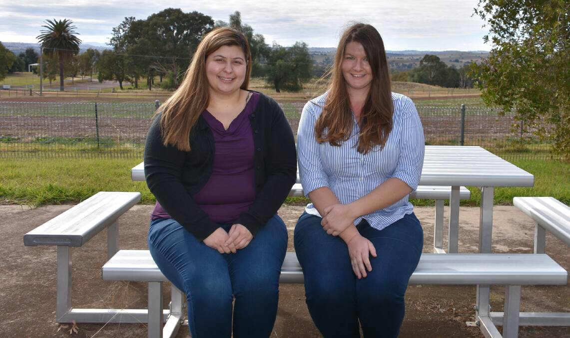 Masters students Bridgette Logan and Ashleigh Kilgannon are both hard at work at the Cowra Agricultural Research and Advisory Station. 