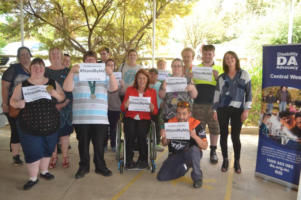Clients and staff from Cowra Special Needs Services with Ms Liesl Tesch MP (centre) Regional Manager and Advocate for Disability Advocacy NSW Sue Smidt and NDIS Appeals officer and Advocate Evie May. 
