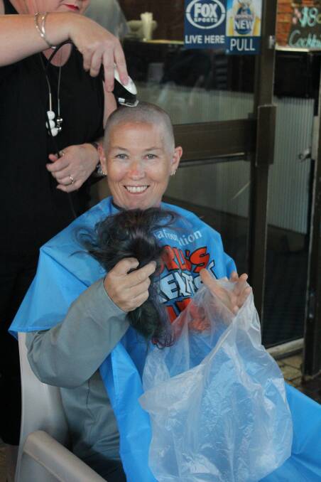 Pam Porter with her hair after the World's Greatest Shave resulted in it all being shaved off. 