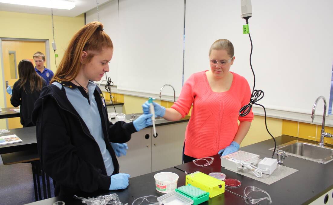 Mia Ashton with Cowra High School science teacher Megan Mackenzie during the initial AMGEN science pilot in May. 
