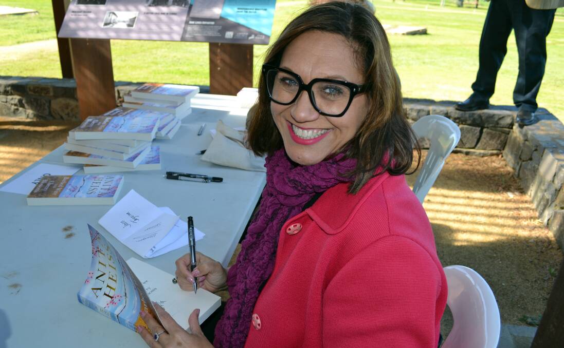 Author Anita Heiss signs copies of her new book "Barbed Wire and Cherry Blossoms", at the novel's launch last Friday at the Cowra Prisoner of War Camp. She launched the novel on the 72nd Anniversary of the Cowra Breakout.