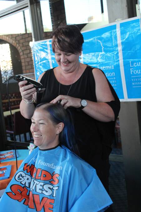 Hairdresser Karen Budge with Pam Porter during the World's Greatest Shave last week. 