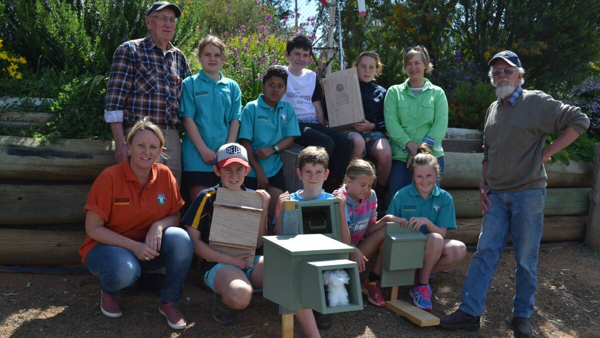 The junior committee spent time during the school holidays to build houses for endangered species.
