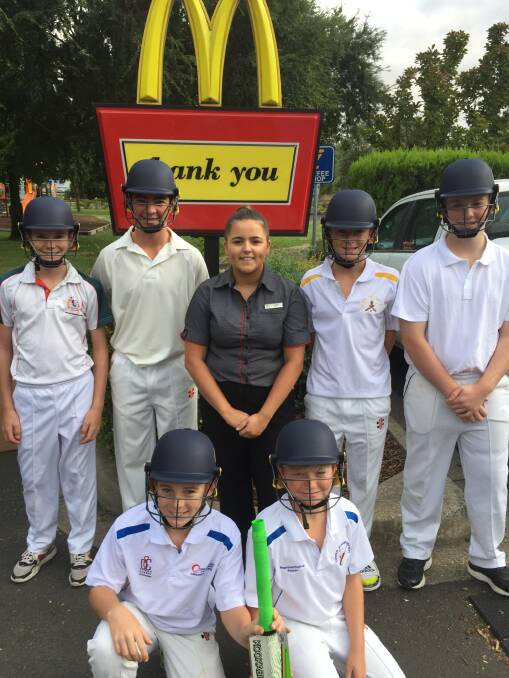 Mac Webster, Bill Statham, Sarah (McDonalds manager), Darcy Callaghan and Mitchell Amos show off the new helmets along with Bailey Callaghan and Jackson McLeish.