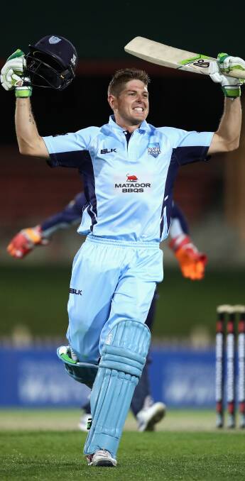 Daniel Hughes celebrates his 100 on Sunday night. Photo by Getty Images.