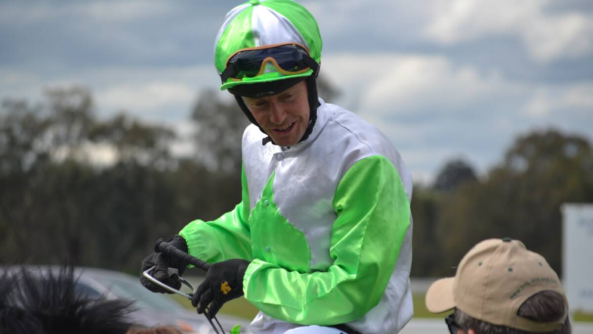 Mathew Cahill is all smiles after his second victorious ride at Tuesday afternoon's Cowra Jockey Club meeting.