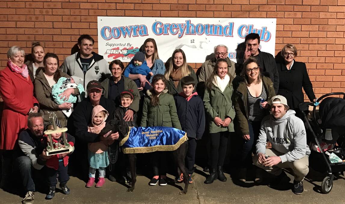 The Braddon family pictured at the Cowra Greyhound track with 2016 Janet Braddon Memorial winner Falcon's Fury, trained by Paul Braddon.