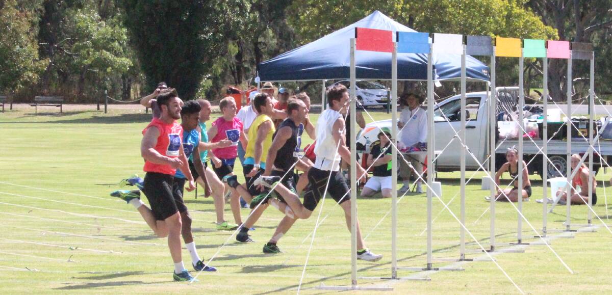 Michael Kember beats the field home in the Cowra Gift (120m) on Saturday afternoon at Twigg Oval.