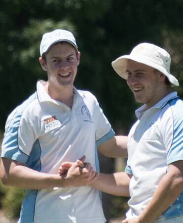 Charlie Johns and Kurt Johnstone celebrate a wicket during Saturday's match at Twigg Oval. Their side Bowling Club are in this weekend's Twenty20 decider.