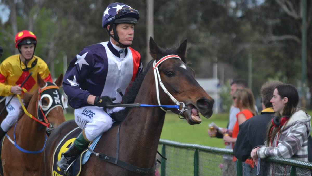 Mathew Cahill returns to scale on board Super Pig after winning race one, a benchmark 60 handicap.