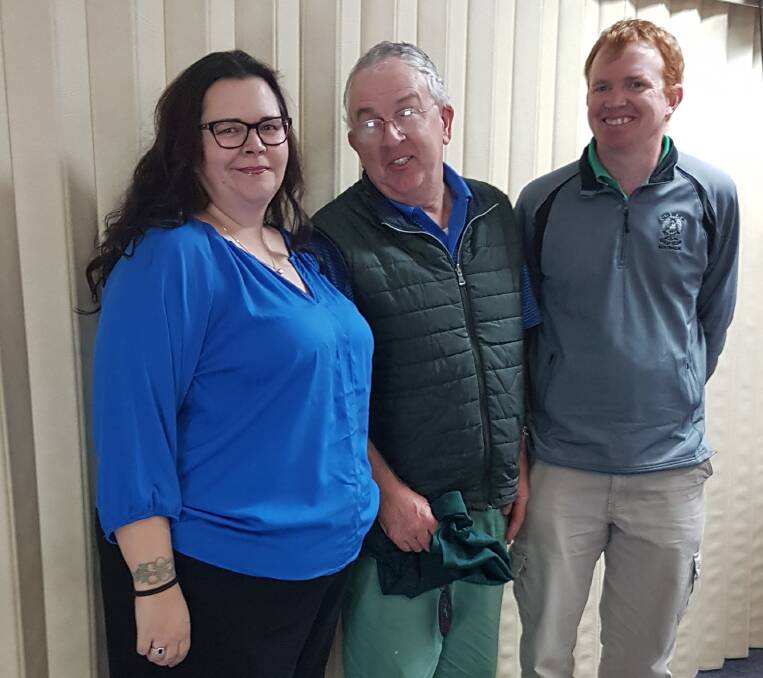Greg Bowen receiving his prize from Dion and Sarah McAlister. Bowen lead the C grade field in last weekend's Stableford.