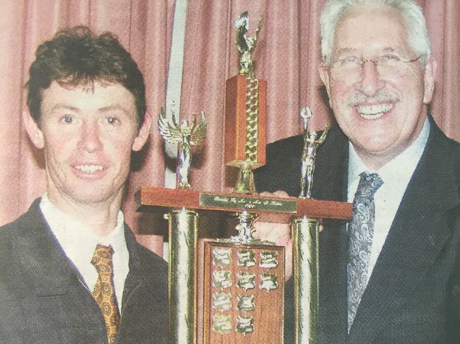 Max Walker pictured with Cowra jockey Mathew Cahill, the 2004-2005 Sportsperson of the Year award winner at the awards presentation.