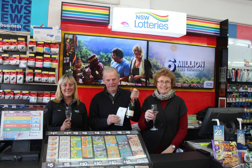 Lisa Mathey, Bob Vidulich and Margo Vidulich celebrate the $1 million winning ticket being bought from their store.