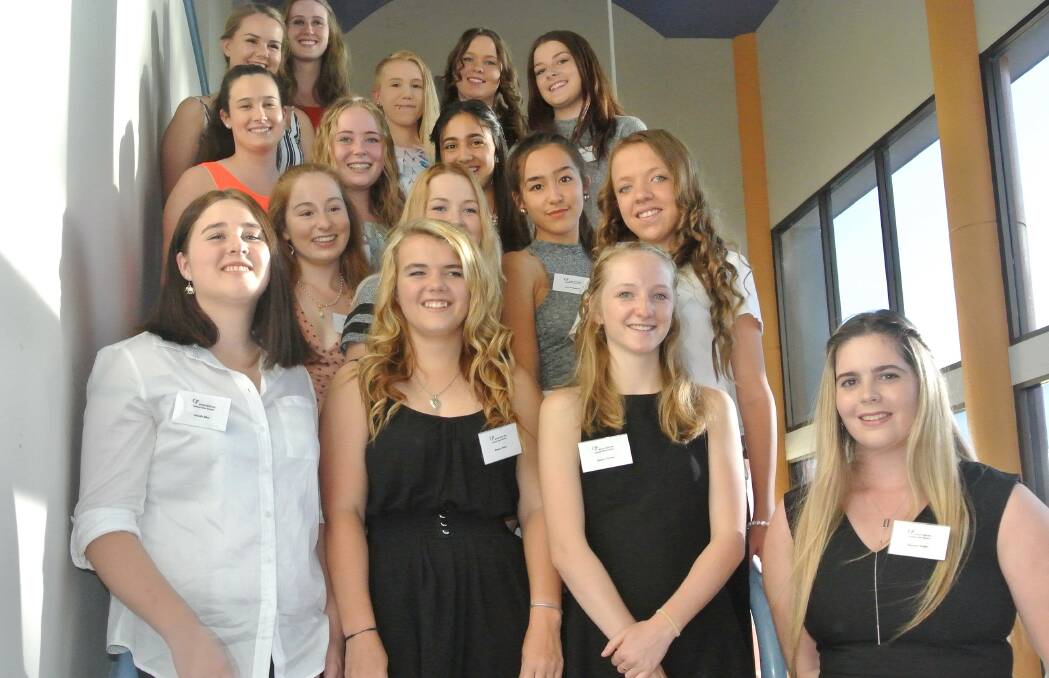 Previous successful applicant Georgia Waters pictured with current year 12 students at the Scholarship Dinner in February 2016 .