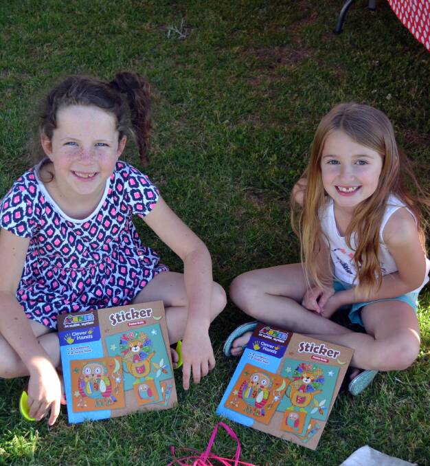 Kiah Murray and Sienna Grant enjoy the 2015 Mulyan Public School Spring Fair. This year is set to be just as fun with plenty going on for the whole family. 