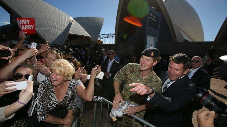Prince Harry and the Premier, Mike Baird, greet crowds at the Opera House/ Photo: Louise Kennerley