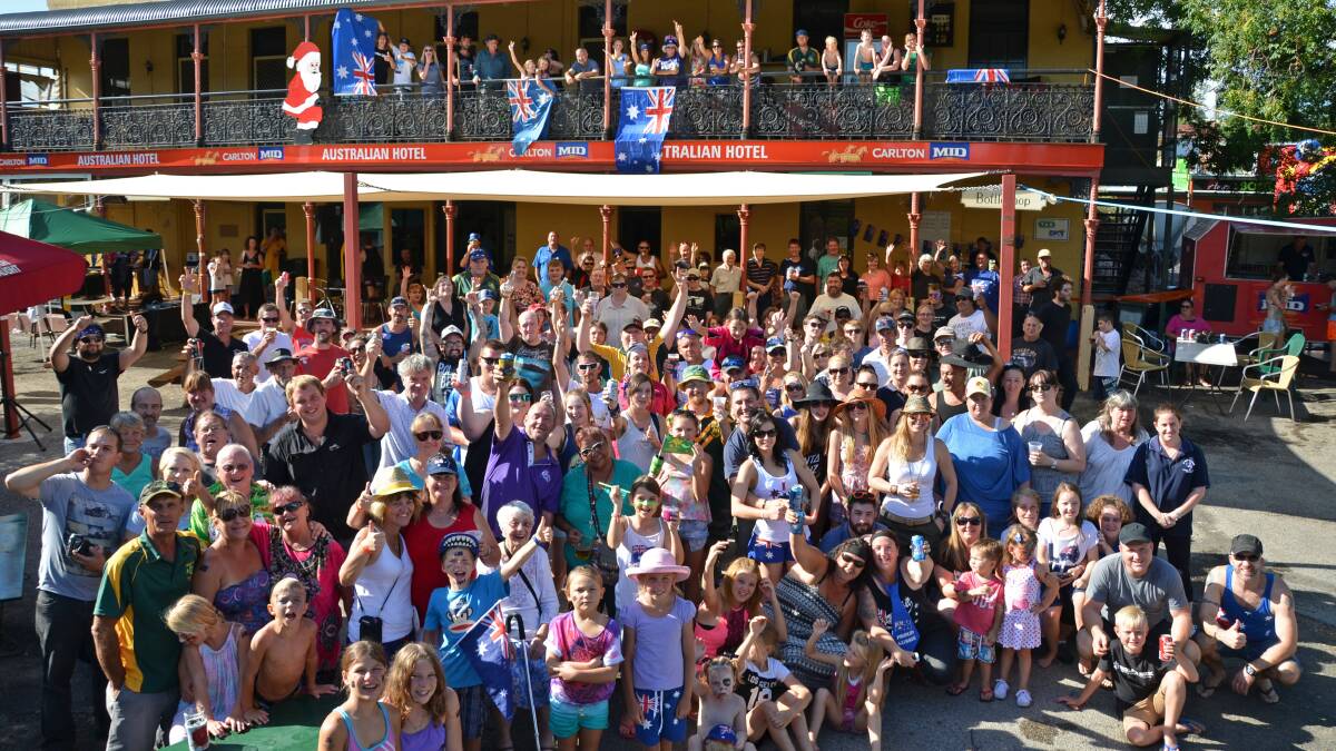 The traditional Australia Day photo at the Aussie Hotel in 2015. Photo: Garth Collins.
