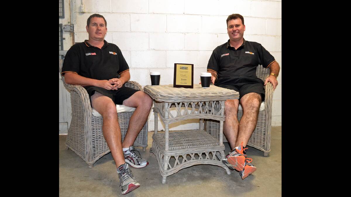 Brooks Bed r Us staff Jono Gee and Michael Brooks take a moment to relax after winning the Furniture House Group award for Increased Gold Sales recently.