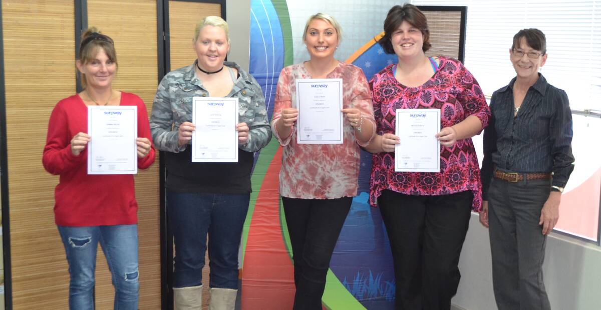 From left to right: Donna Fields, Janet Anthony, Jessica Neels and Michelle Kelleher proudly hold their Certificate Three Aged Care awards. Joining them is their teacher Judy Wilson (far right) Absent: Hayley Richards, and Teresa Bridges.