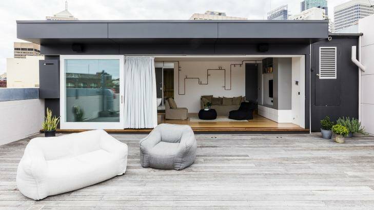 The old caretaker's flat on the roof has been turned into a guest bedroom. Photo: Supplied