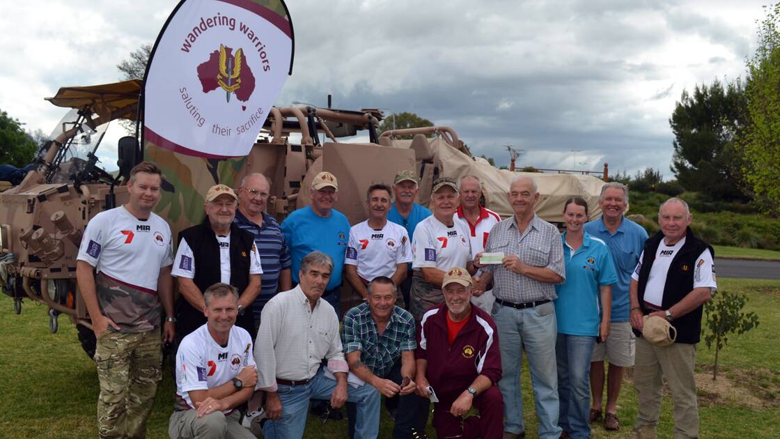 Bruce Holt from the Vietnam Veterans Association passed over a cheque for $2000 to the Wandering Warriors.