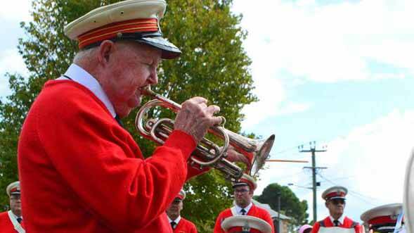 Toby McLeish, bugle in hand, at the 2015 Anzac commemorations.