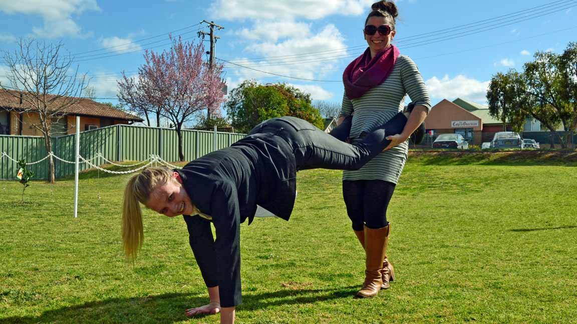 Belinda Cleary and Jacquie Dolbel have already been practising for this weekend's wheelbarrow race. 