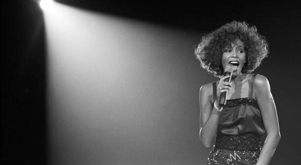 Whitney Houston performing on stage in 2005. Her struggle with drugs is explored in the new documentary Whitney: Can I Be Me. Photo: David Corio