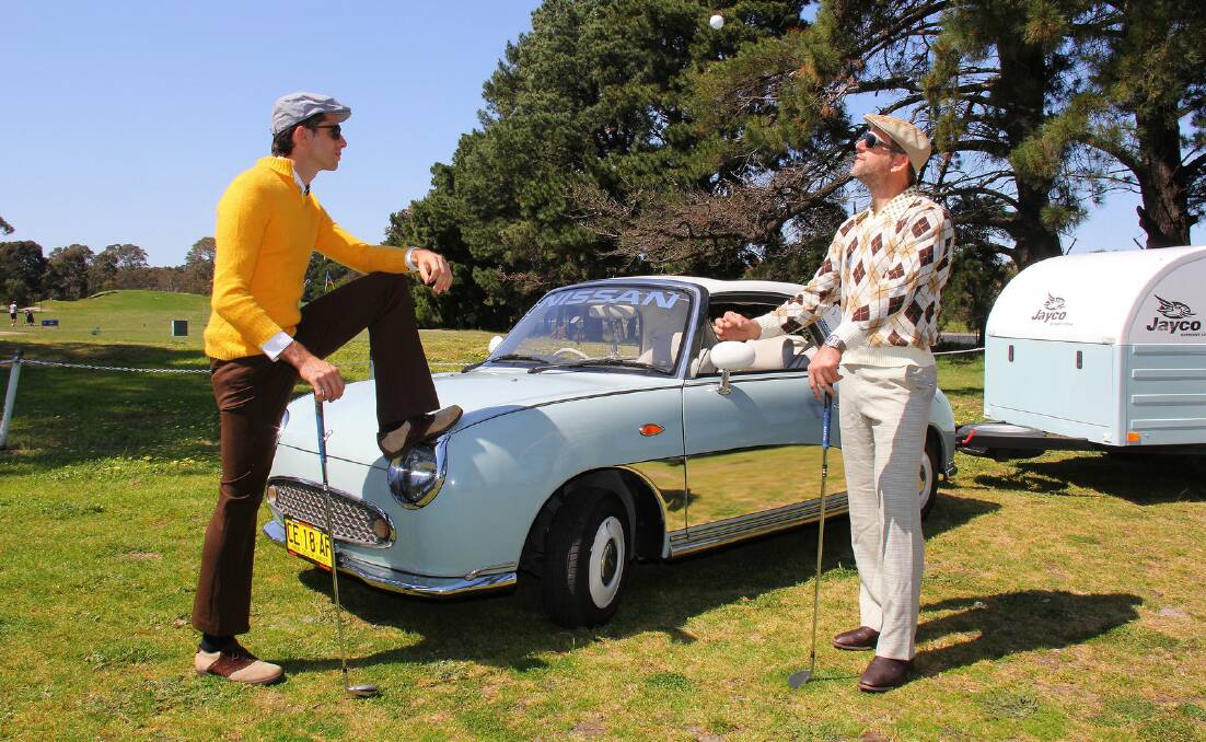 RETRO RULES: Rick and Todd Kelly stand with the Nissan Figaro they will be driving on their annual road trip to the Bathurst 1000. 
