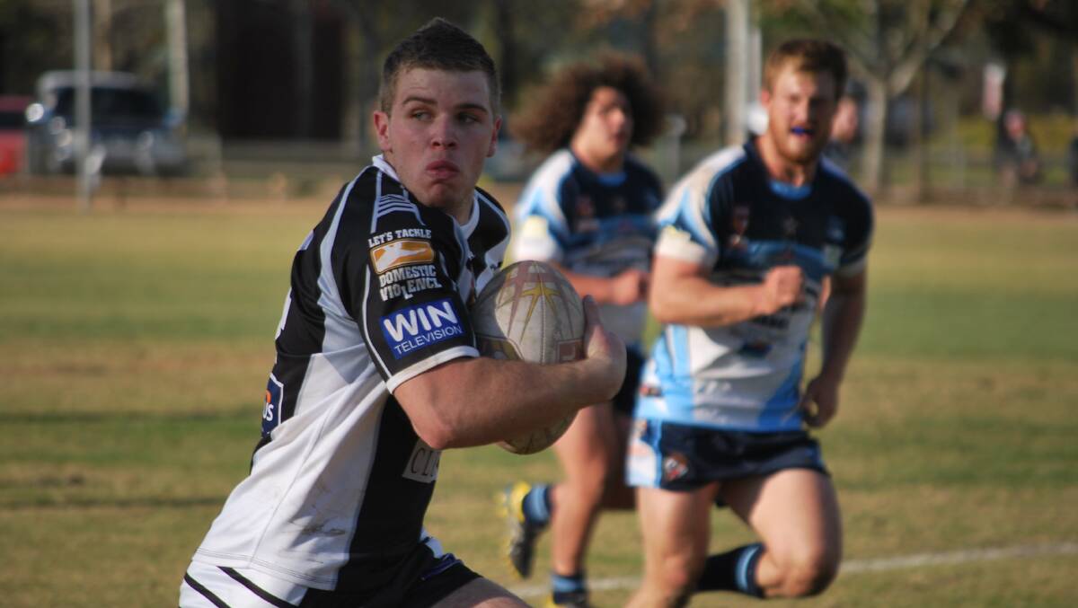 Mitch Browne makes a break in the Magpies victory over Orange Hawks.