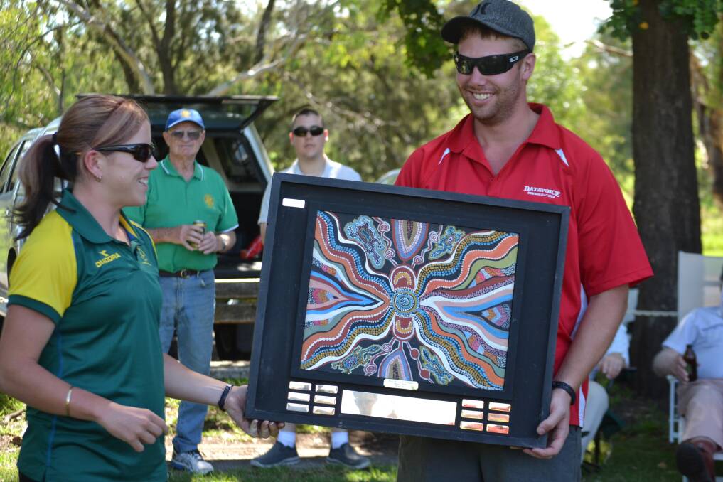 Cowra's Australia Day guest and gold medal Paralympian, Jodi Elkington, presents Sam McNaught with the winners trophy.