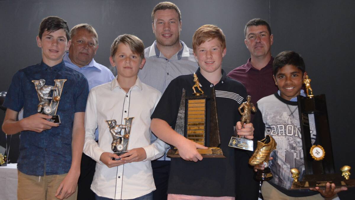 Left to right: Under 13s award winners Max Coady, Rod Eastwood (coach), Sonny Eastwood, Shannon Boyd, Dylan Whitty, Angelo Baratto (trainer) and Jaylan Simpson.