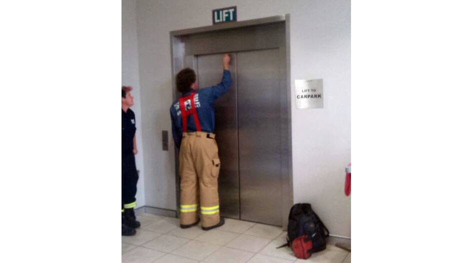 Fire NSW personnel on scene at a shopping centre in Cowra where a woman and two children were stuck in a lift this afternoon.