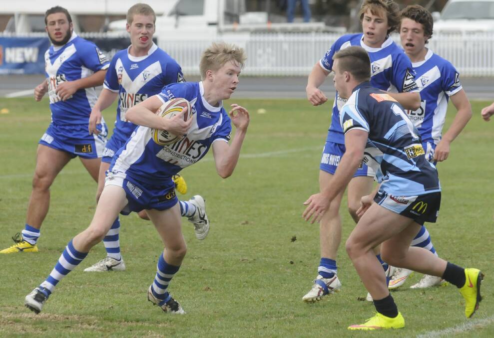 FINALS GONE: It was tough going for Tom Olson and St Pat’s Group 10 under 18s in Saturday’s 44-20 defeat to the Mudgee Dragons. Photo: CHRIS SEABROOK 053115cu18s2b