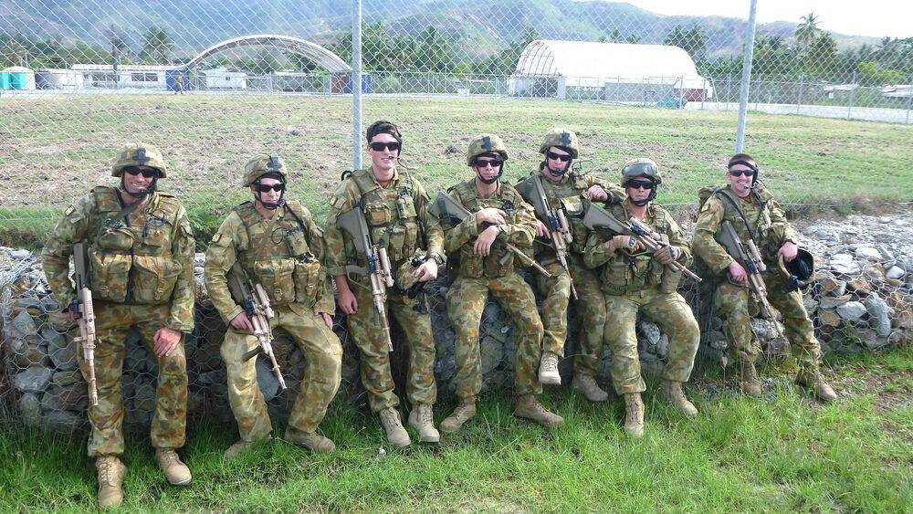 One Platoon, 3 Section in East Timor, including soldiers from Cowra. Left to right: Lance Corporal Allan Akhurst, Private Matthew Maguire, Private James Davies, Cowra's Private Anthony Benton, Private Benjamin Corbett, Private Brenton Traves of Cowra, and Private Owen O'Shea.