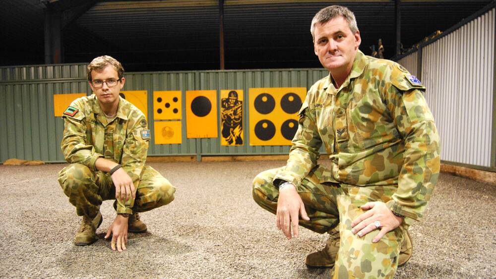 Private Anthony Benton and Corporal Craig Simpson, who served for three months in East Timor with the 6 Platoon B Company 1/19, in Cowra's Army Reserve facility.