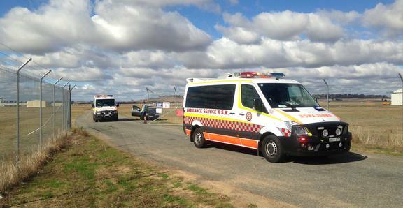 Paramedics take the injured pilot and passenger to Wagga Base Hospital.