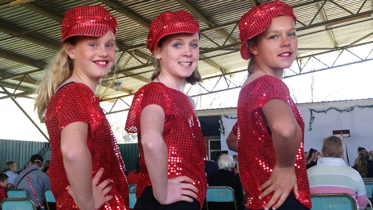 Jade Browne, Chloe Fricker and Bree Moodie danced with Mulyan Public School's dance group.