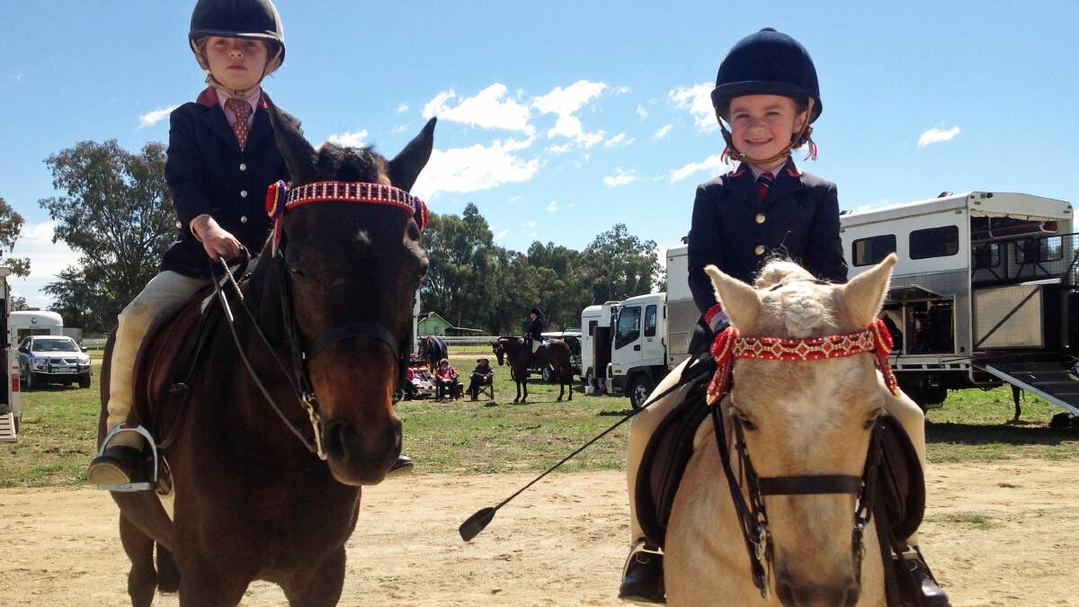 Coco Guenther on Holly and Emma Hutchinson on Pip spent Wednesday competing at the Cowra Show.