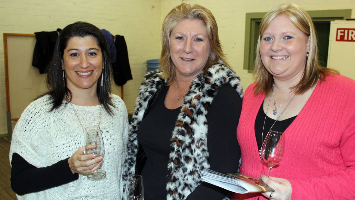 Picture: Rosa Napoli, Tracie Lambert-Smith and Sam Wilson enjoying the wine at the tasting.